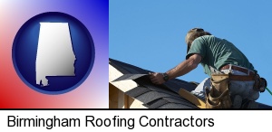 a roofing contractor installing asphalt roof shingles in Birmingham, AL