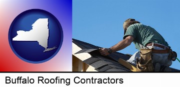 a roofing contractor installing asphalt roof shingles in Buffalo, NY