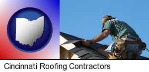 a roofing contractor installing asphalt roof shingles in Cincinnati, OH