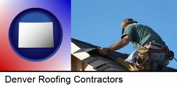 a roofing contractor installing asphalt roof shingles in Denver, CO
