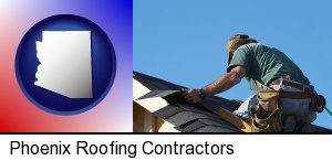Phoenix, Arizona - a roofing contractor installing asphalt roof shingles