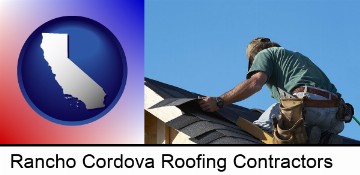 a roofing contractor installing asphalt roof shingles in Rancho Cordova, CA