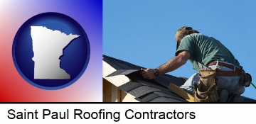 a roofing contractor installing asphalt roof shingles in Saint Paul, MN
