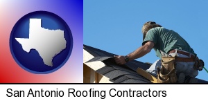 San Antonio, Texas - a roofing contractor installing asphalt roof shingles