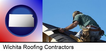 a roofing contractor installing asphalt roof shingles in Wichita, KS