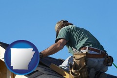 arkansas map icon and a roofing contractor installing asphalt roof shingles
