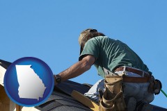 georgia map icon and a roofing contractor installing asphalt roof shingles