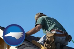 north-carolina map icon and a roofing contractor installing asphalt roof shingles