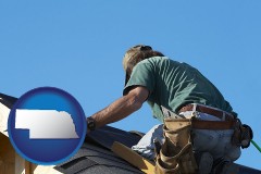 nebraska map icon and a roofing contractor installing asphalt roof shingles
