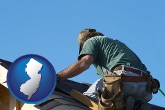 new-jersey map icon and a roofing contractor installing asphalt roof shingles