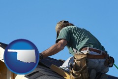 oklahoma map icon and a roofing contractor installing asphalt roof shingles