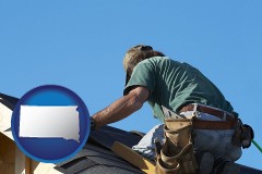 south-dakota map icon and a roofing contractor installing asphalt roof shingles