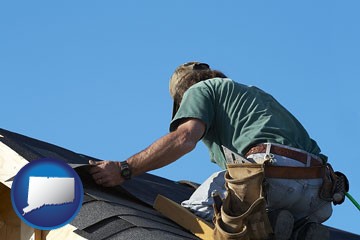 a roofing contractor installing asphalt roof shingles - with Connecticut icon