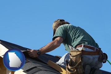 a roofing contractor installing asphalt roof shingles - with Georgia icon