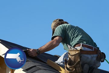 a roofing contractor installing asphalt roof shingles - with Massachusetts icon
