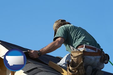a roofing contractor installing asphalt roof shingles - with Montana icon
