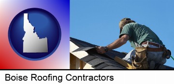 a roofing contractor installing asphalt roof shingles in Boise, ID