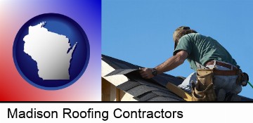 a roofing contractor installing asphalt roof shingles in Madison, WI