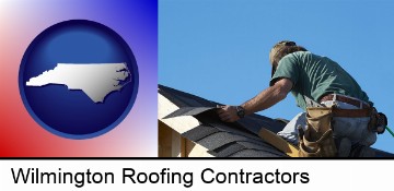 a roofing contractor installing asphalt roof shingles in Wilmington, NC