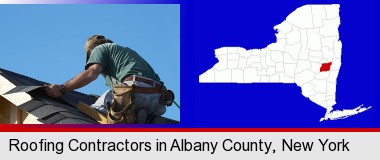a roofing contractor installing asphalt roof shingles; Albany County highlighted in red on a map